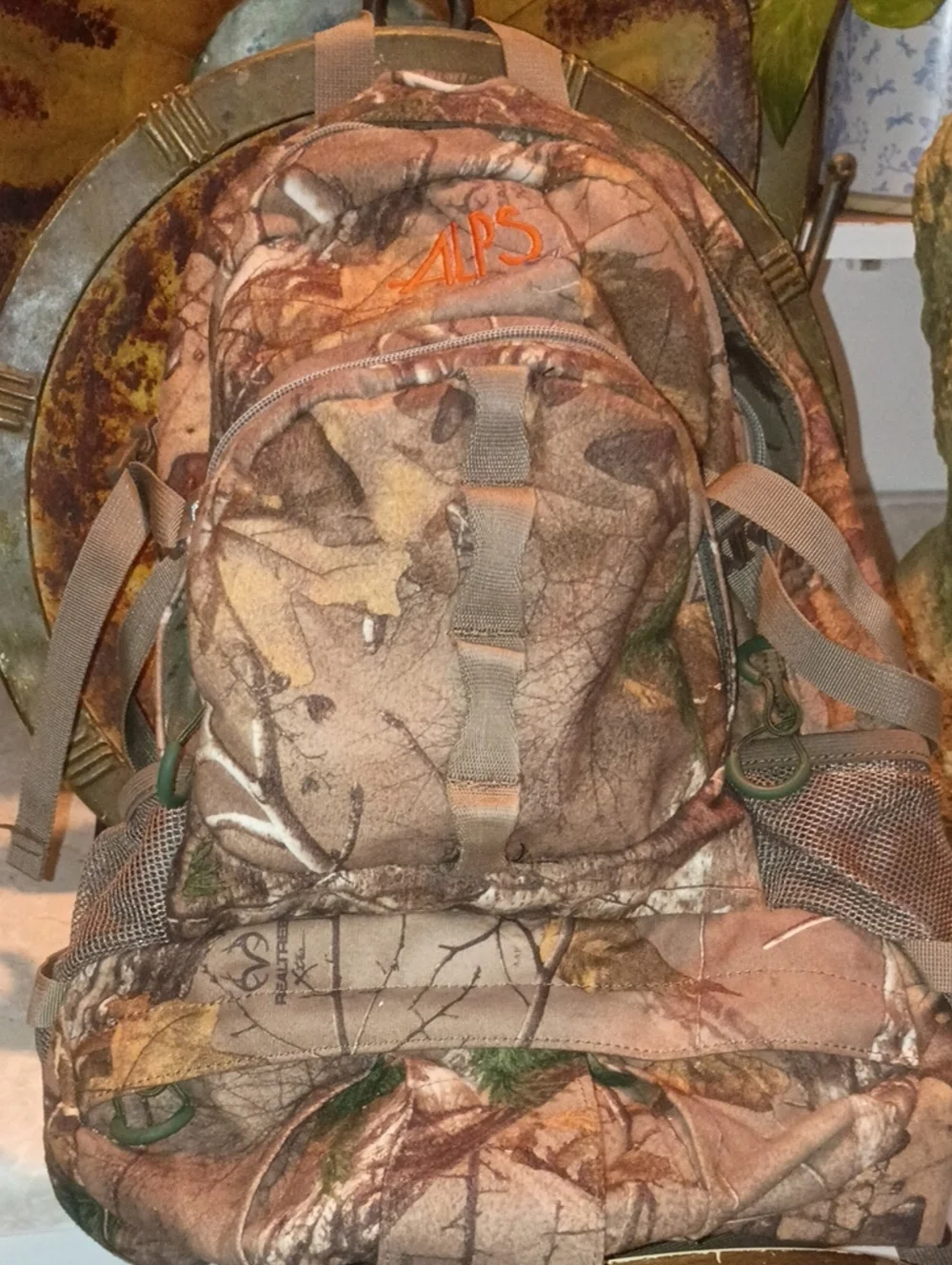 Realtree Men's Camo Backpack in Brown and Green with Orange Logo